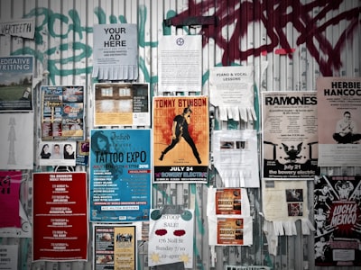 Posters on a wall. 