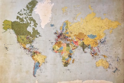 World map to be scanned by a large format scanner. 