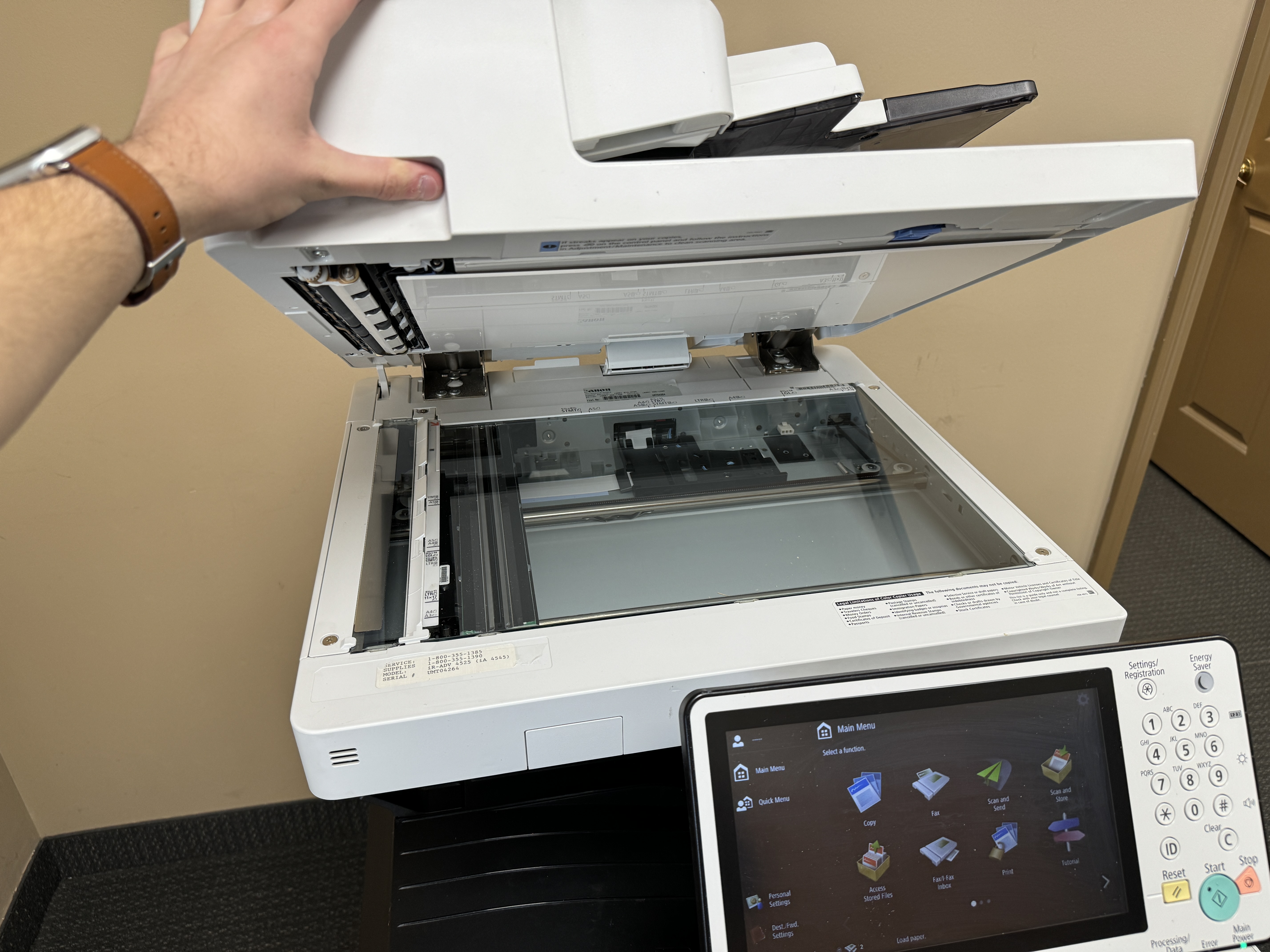 Scanning lid for scanning a document.